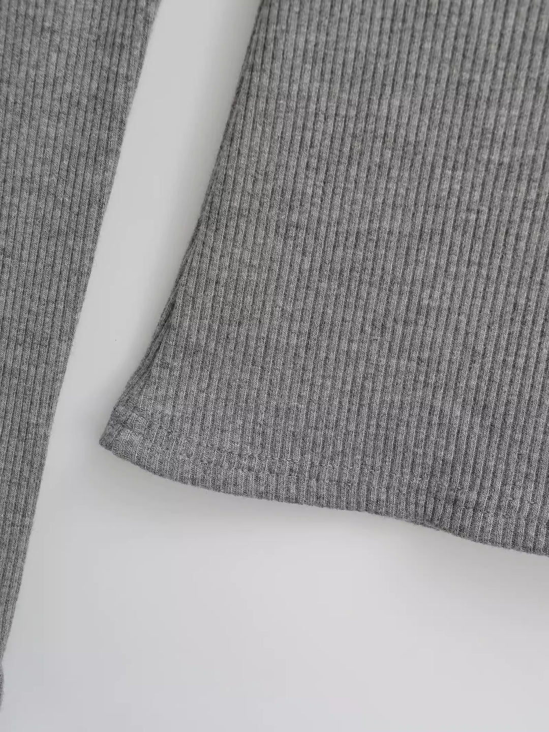 アシンメトリーネックリブトップス