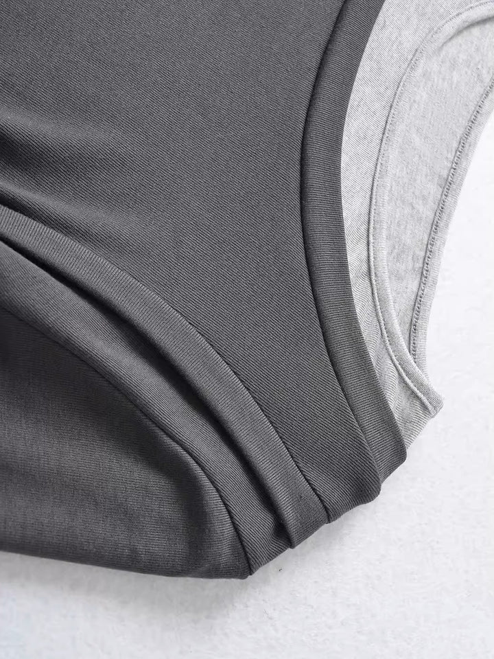 バイカラーレイヤードデザイントップス