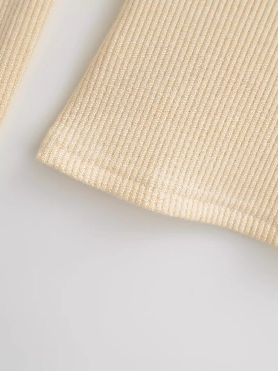 アシンメトリーネックリブトップス