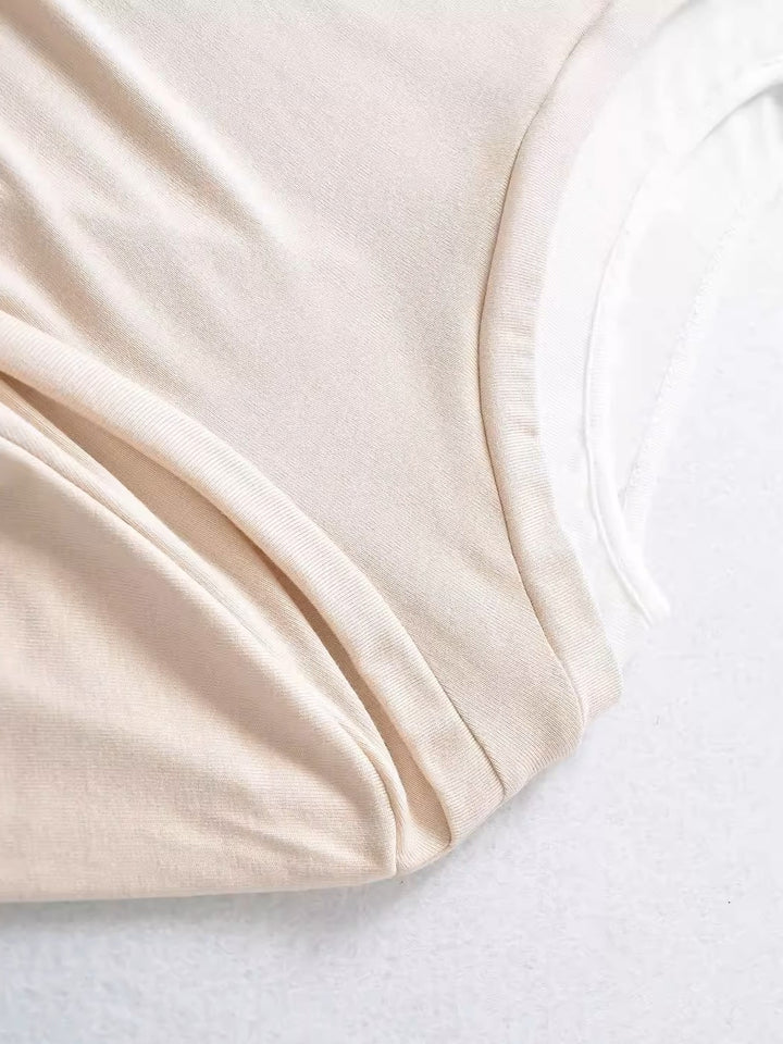 バイカラーレイヤードデザイントップス